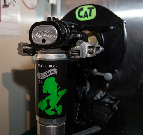 Pinocchio's Beer Garden crowlers machine